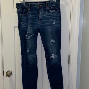 Dark wash jeans with holes